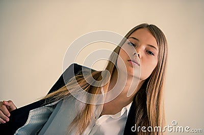 Girl in a dark suit Stock Photo