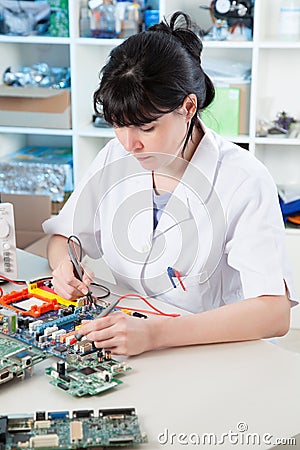 Debugging an electronic precision device Stock Photo