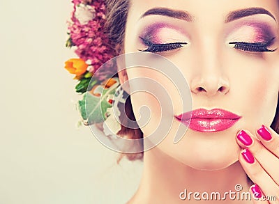 Girl with delicate flowers in hair Stock Photo