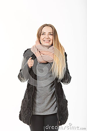 A girl in demi-season clothes with a bag on a white background. Stock Photo