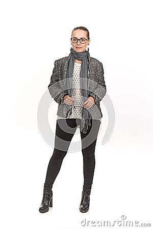 A girl in demi-season clothes with a full-length on a white background. Stock Photo