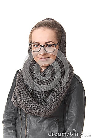 A girl in a demi-season clothes In a snood on a white background. Stock Photo