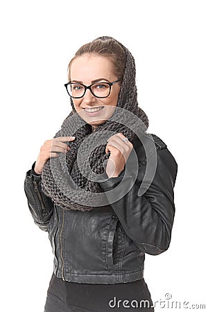 A girl in a demi-season clothes In a snood on a white background. Stock Photo