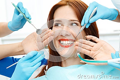 Girl in dentist chair showing the perfect smile Stock Photo