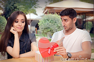 Girl Disappointed on Her Valentine Gift From Boyfriend Stock Photo