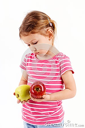 Girl dislikes apples Stock Photo