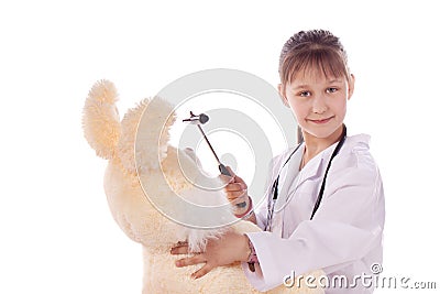 Girl, a doctor, the child, rabbit toy Stock Photo