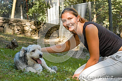 Girl with a dog at the animal shelter Editorial Stock Photo