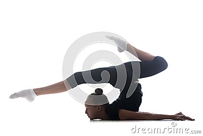 Girl doing art gymnastics Stock Photo