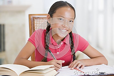 Girl Doing Her Homework Stock Photo