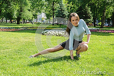 Girl doing stretching exercises for the feet Stock Photo