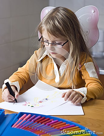 Girl drawing at home Stock Photo