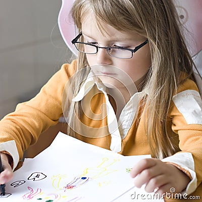 Girl drawing at home Stock Photo