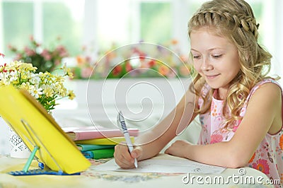 girl drawing at home Stock Photo