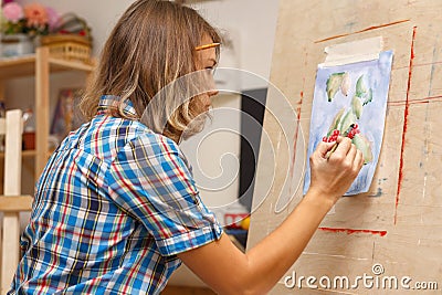 Girl draws a still-life Stock Photo