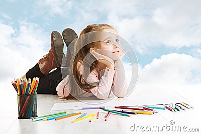 Girl dreaming, looking for drawing idea. Inspiration and creativity Stock Photo