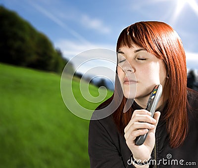 Girl dreaming watching television Stock Photo