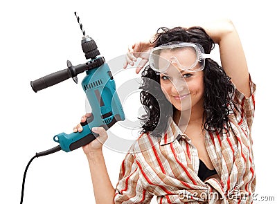 Girl with drilling machine Stock Photo