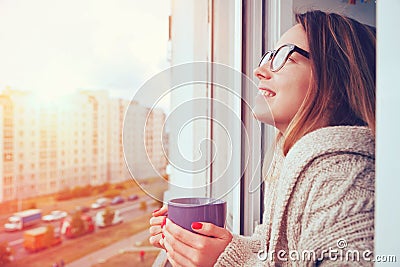 Girl drinking coffee in morning Stock Photo