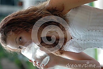 Girl drinking water Stock Photo