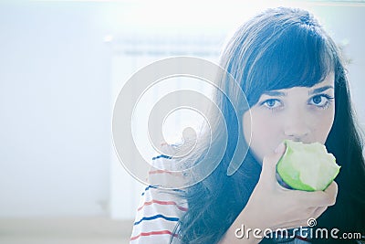 Girl eating apple Stock Photo