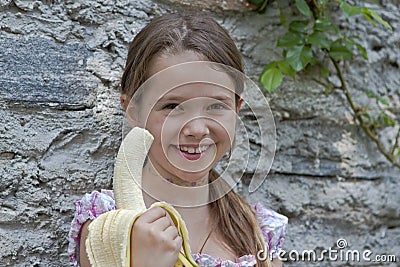 Girl is eating fruits Stock Photo