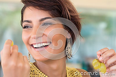 Girl Eating Grapes Stock Photo