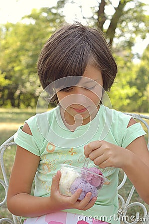 Girl Eating Ice Cream Stock Photo