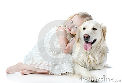 Girl embraces a Golden Retriever. Stock Photo