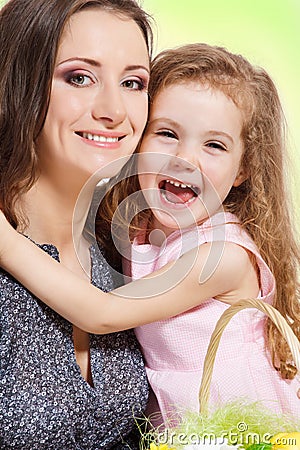 Girl embracing mother Stock Photo