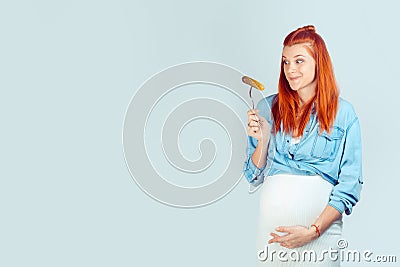 Girl enjoying pickle being pregnant Stock Photo