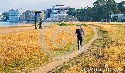 girl enjoying running on a beatiful road Stock Photo