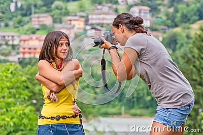 Girl exercises to photograph a portrait during a photography course Stock Photo