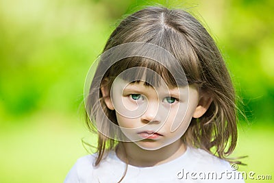 Girl face, sad blue eyes, close up Stock Photo