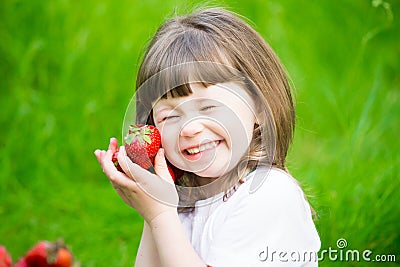 Girl face, strawberry, fun, close up Stock Photo