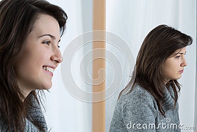 Girl with fake smile Stock Photo