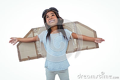 Girl with fake wings pretending to be pilot Stock Photo