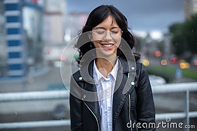 On girl are falling the first breath rain. Stock Photo