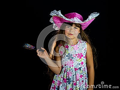 Girl with fan and mask in dress Stock Photo