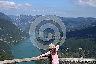 A girl on a fantastic viewpoint Banjska Stena Tara mountain Stock Photo