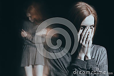 Girl feeling overwhelming loneliness Stock Photo