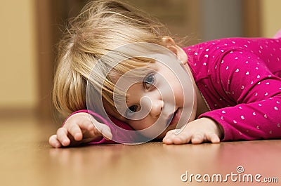 Girl on floor Stock Photo