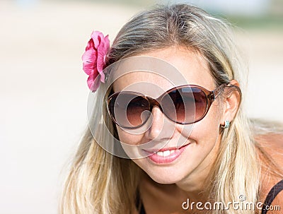 Girl with a flower in her hair Stock Photo