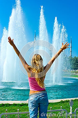 Girl and fountain Stock Photo