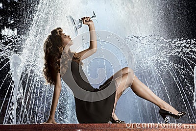 Girl on Fountain Stock Photo