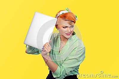 Girl frustrated with laptop retro style Stock Photo