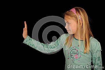 Girl gesturing halt sign Stock Photo