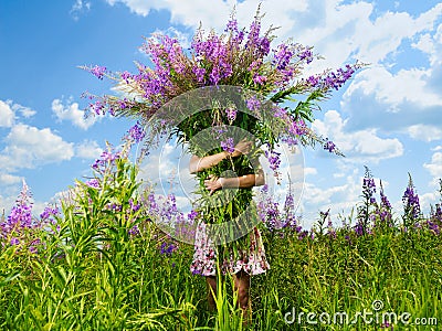 Girl with a giant bouquet of flowers Stock Photo