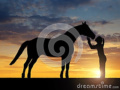 girl giving a kiss horse Stock Photo