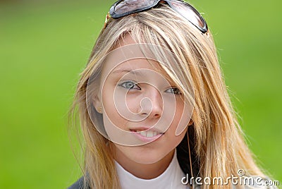 Girl with glasses on head Stock Photo